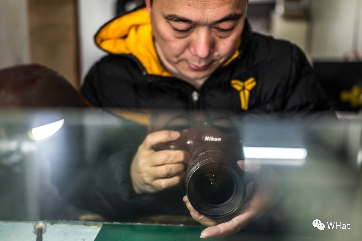 铜人像里藏着修相机的头牌师傅，33年的坚守积累千金不换的口碑