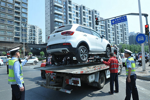 大车遮挡号牌被扣12分,停车遮挡号牌被扣12分怎么处罚