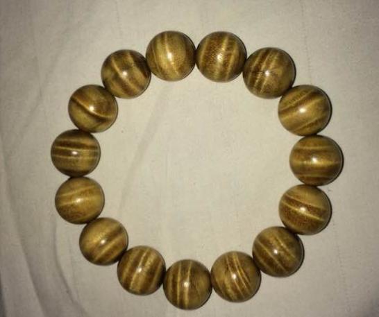 金丝楠木手串价格高低,拼多多的金丝楠木手串9.9是真的吗