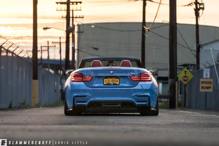 改装的宝马m4直接趴在地上了,普通的宝马m4可以开敞篷