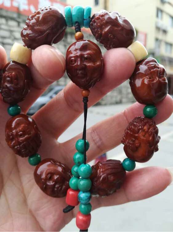 橄榄核雕的作品图片大全,橄榄核雕沈峰作品