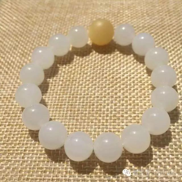 阿富汗玉仿砗磲鉴别和比重,玉化砗磲真假鉴别图片