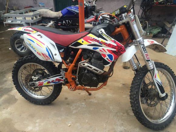 骑着摩托车去野钓,骑电动摩托车去钓鱼