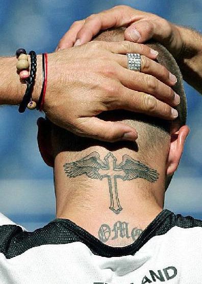 贝克汉姆为什么有那么多纹身,贝克汉姆纹身中文是什么字