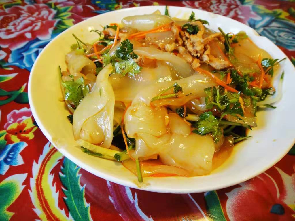 正宗东北大拉皮是酸甜口的吗,东北大拉皮正宗的吃法