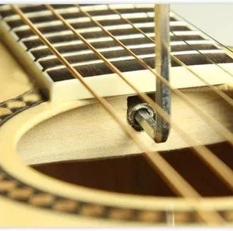 琴弦过高如何调节？