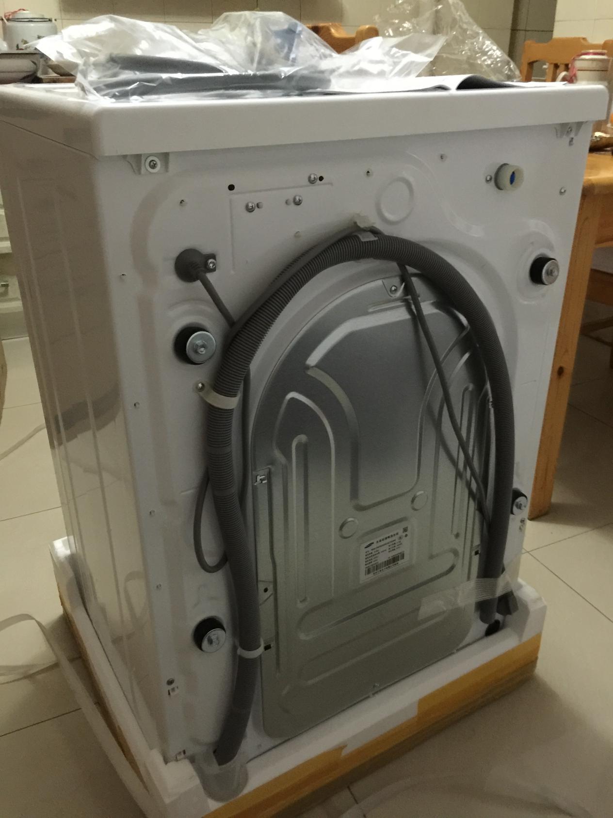 新洗衣机第一次使用转不动,洗衣机脱水时噪音巨大震动移位