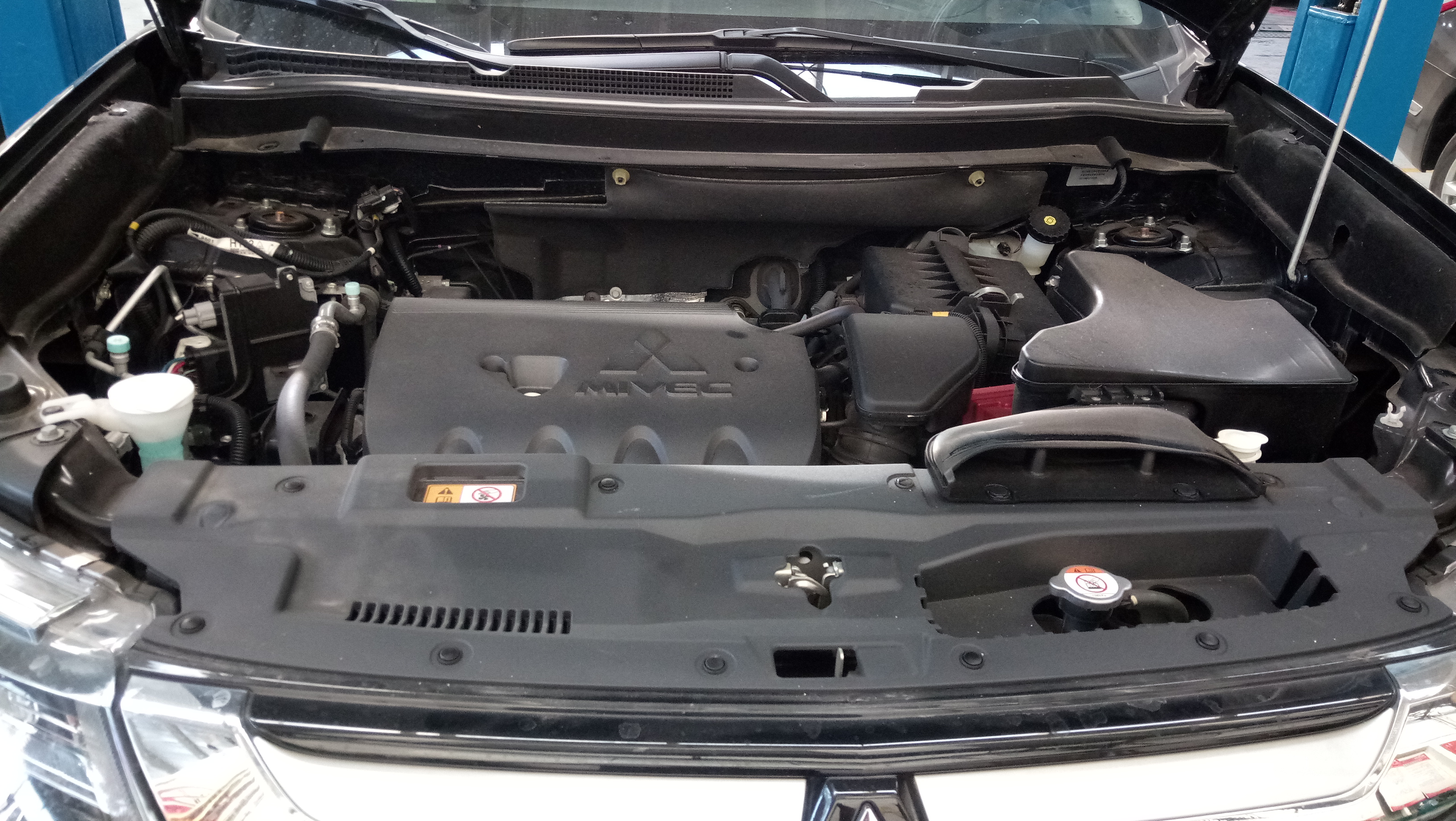 三菱欧蓝德换机油用多少,三菱欧蓝德更换胜牌机油