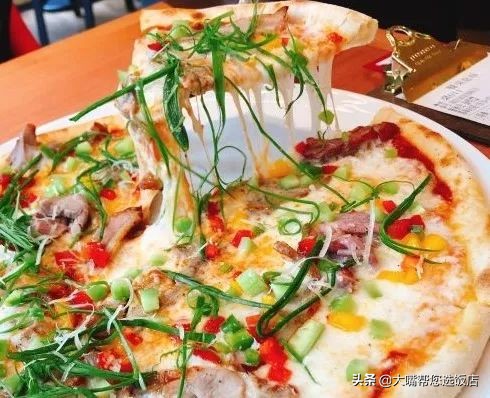 #吃遍大连#披萨的诱惑!一个蕴藏着芝士力量的神物