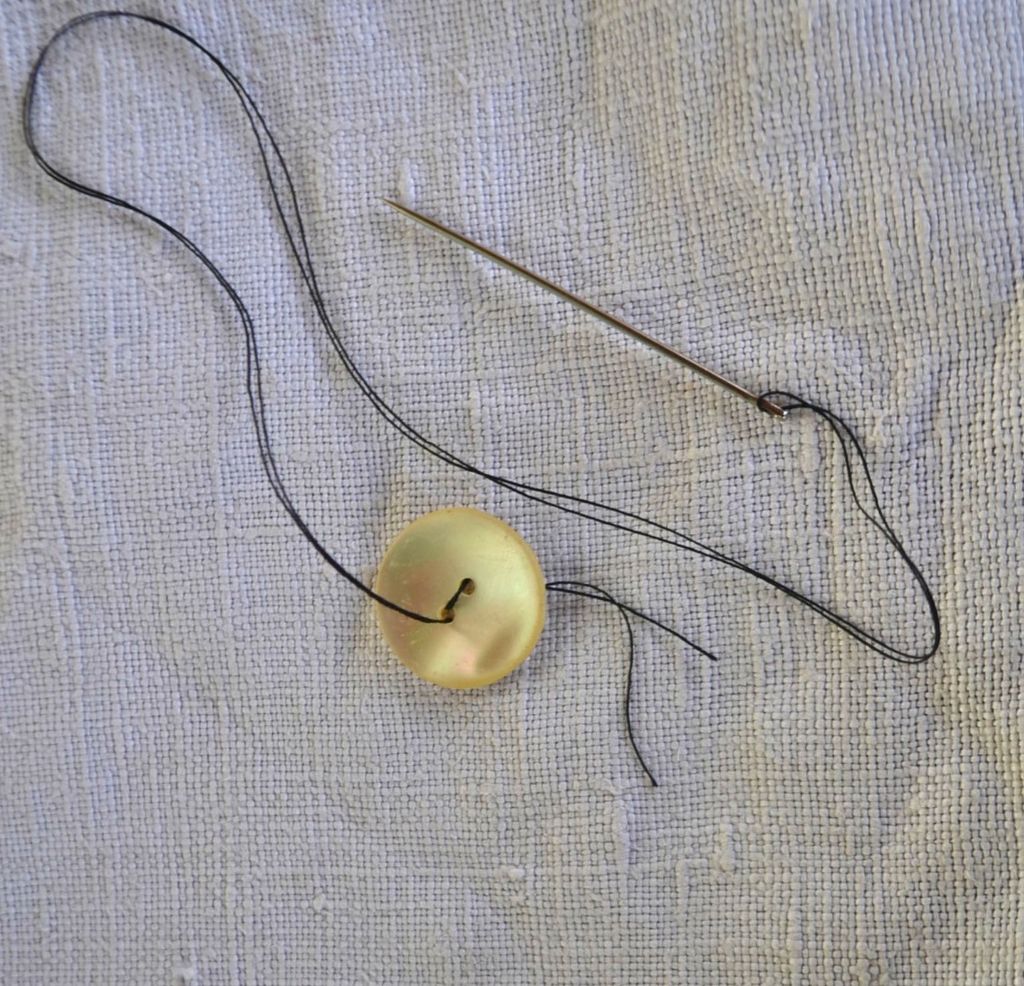 衣服扣纽扣办法,衣服纽扣扣错了怎么取出来