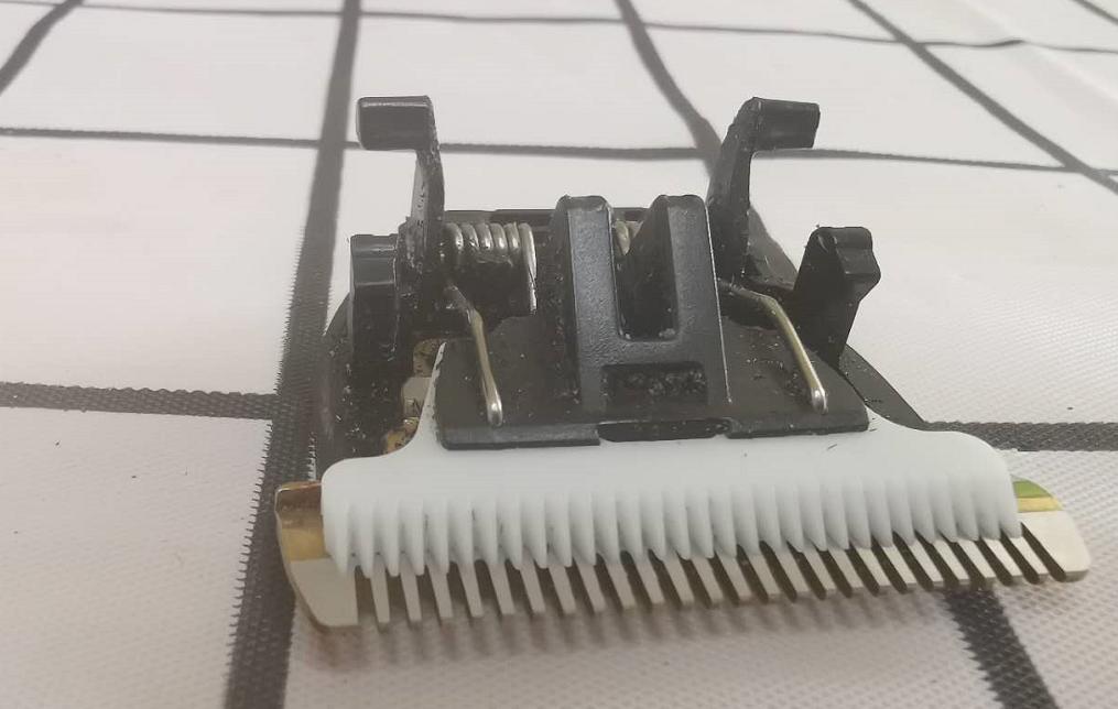 电动理发器推头结构图,理发器的刀头的制作原理