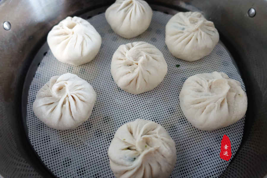 又白又大汁水四溢的包子,又软又好吃的包子