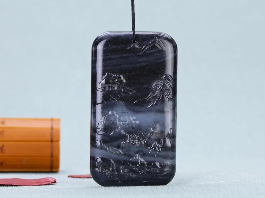 一块墨玉原石多少钱,这块翡翠原石值多少