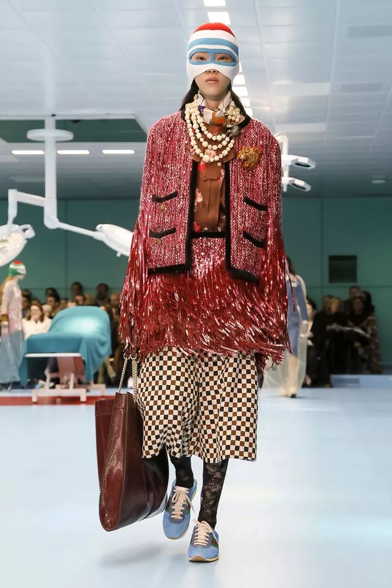 gucci设计理念是什么,gucci品牌标志性设计元素