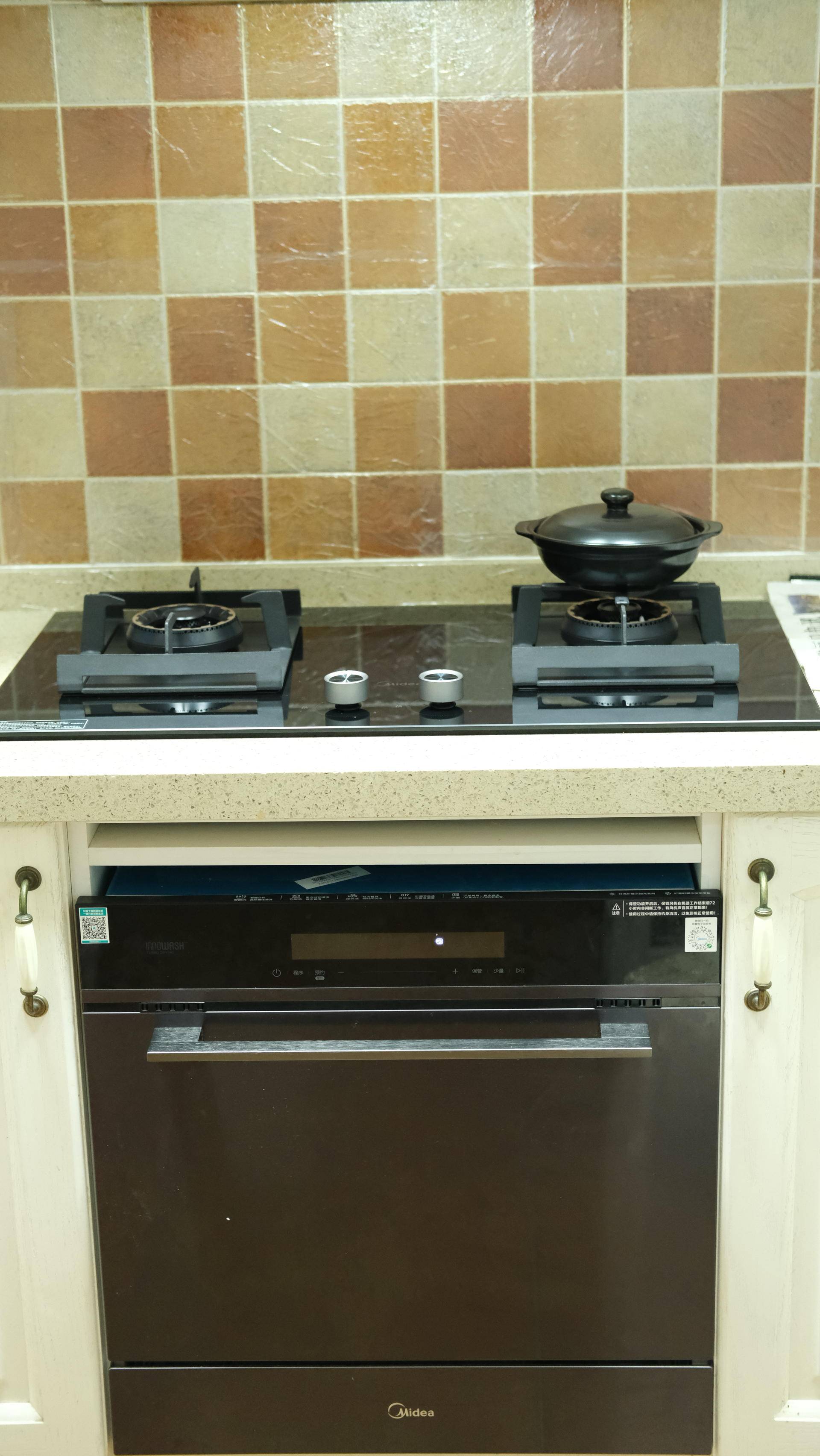 怎样知道燃气灶用了几年了,美的q67燃气灶是高端机吗