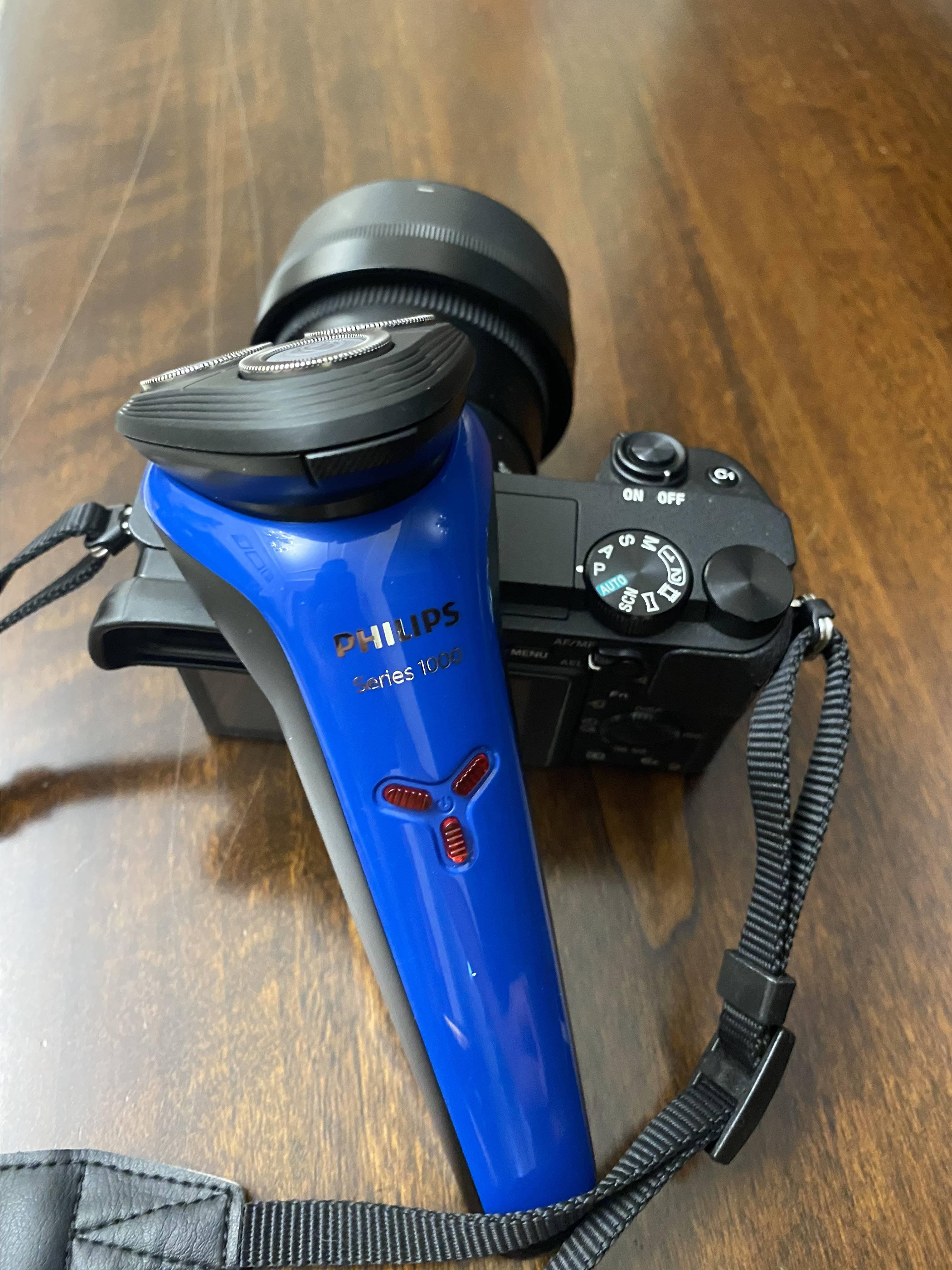 东京飞利浦小旋风剃须刀,飞利浦剃须刀清洗水