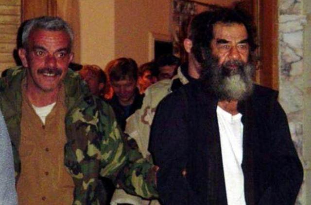 美国布什家族为什么要杀萨达姆,美军为何逮捕萨达姆