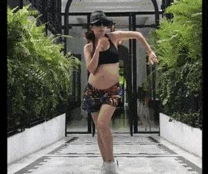 刘璇挑战绸吊劈叉翻转,刘璇平衡木劈叉正面照片