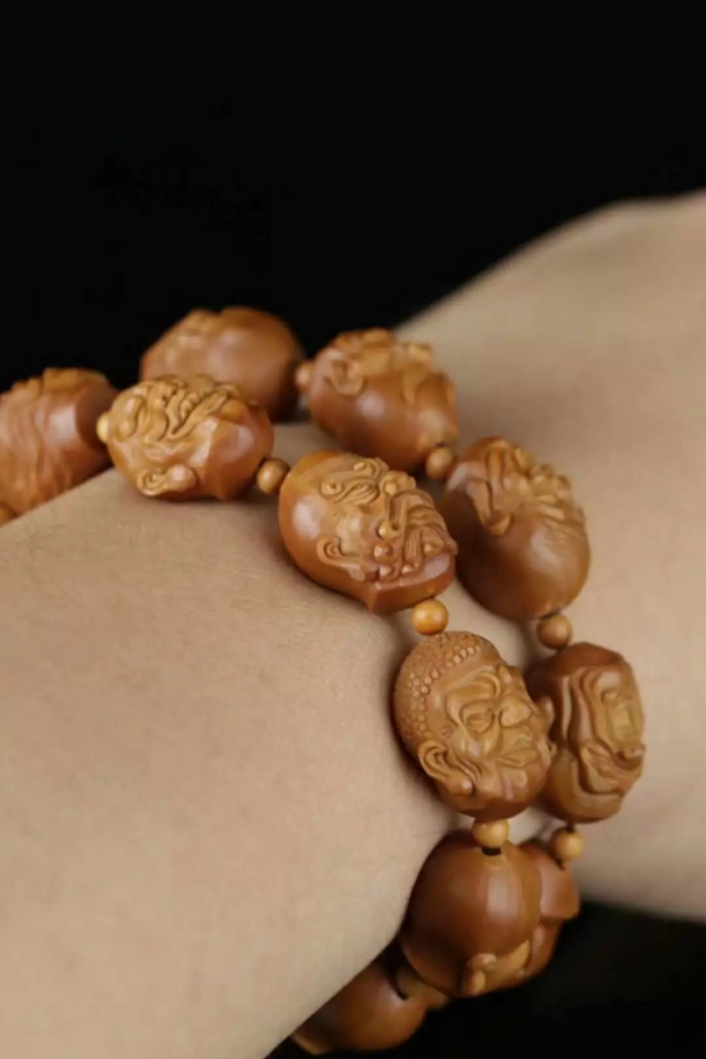 十八罗汉橄榄核怎么按顺序来穿 (核雕十八罗汉怎么区分)