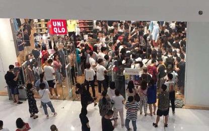 小心！你挡了黄牛冲向优衣库的路