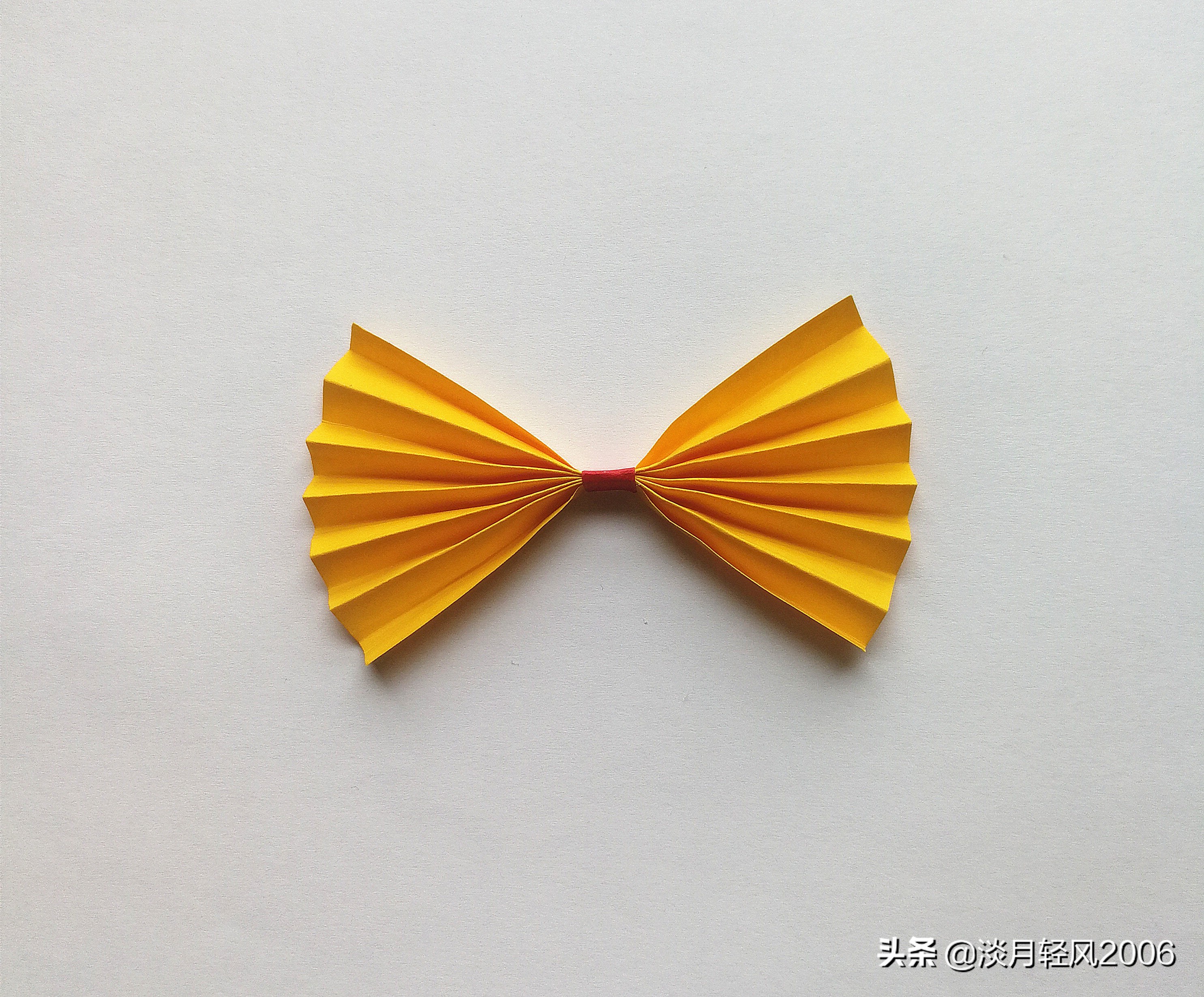 不需要剪刀用卡纸怎么做蝴蝶结,长方形卡纸蝴蝶结怎么折慢教程