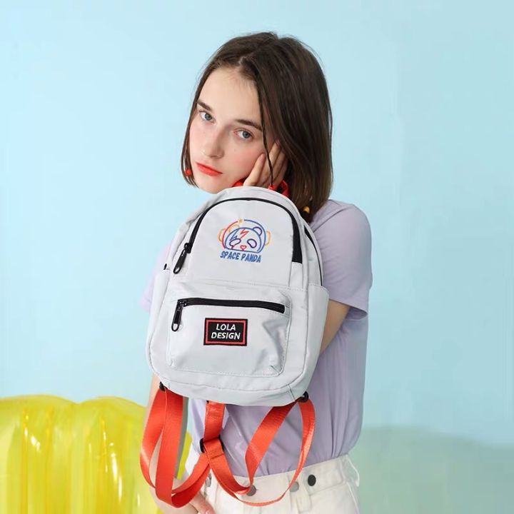 黑色抽绳双肩包出街百搭,双肩包出街推荐大学生小巧