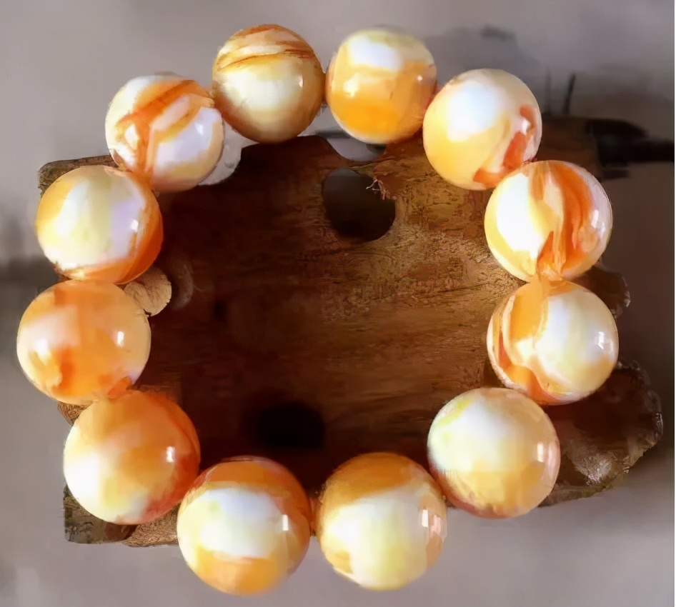 辨别真假蜜蜡的小视频,蜜蜡蓝精灵怎么分真假