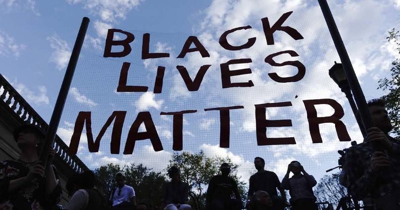 黑人天生自甘堕落？看看被美国白人摧毁的“黑人华尔街”吧