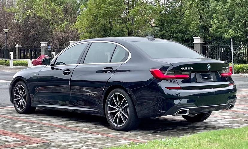 宝马3系和5系哪个更值得买,宝马3系曜夜版好还是5系好