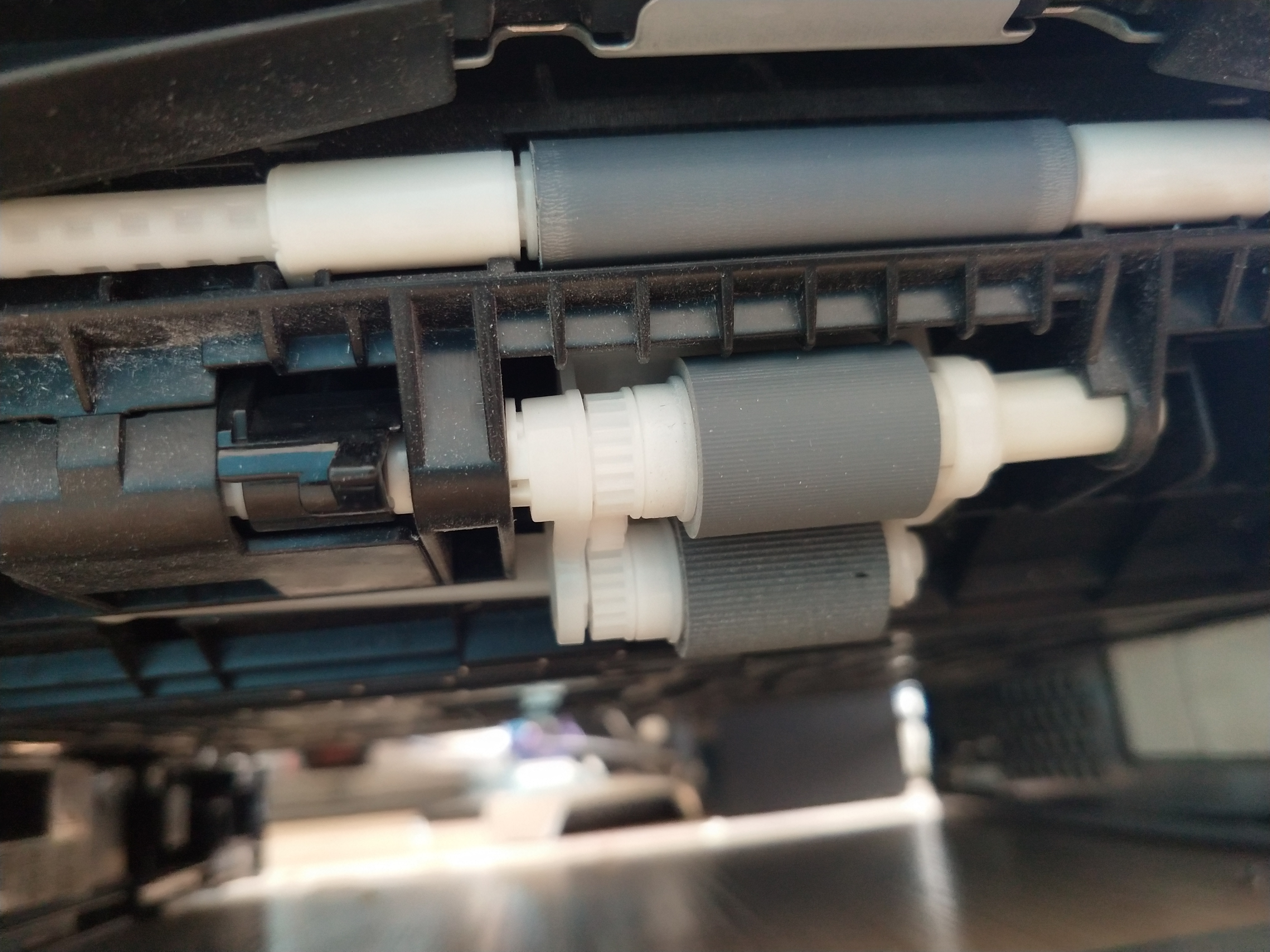 打印机一次出来很多张纸怎么设置,打印机同时出两张纸怎么解决