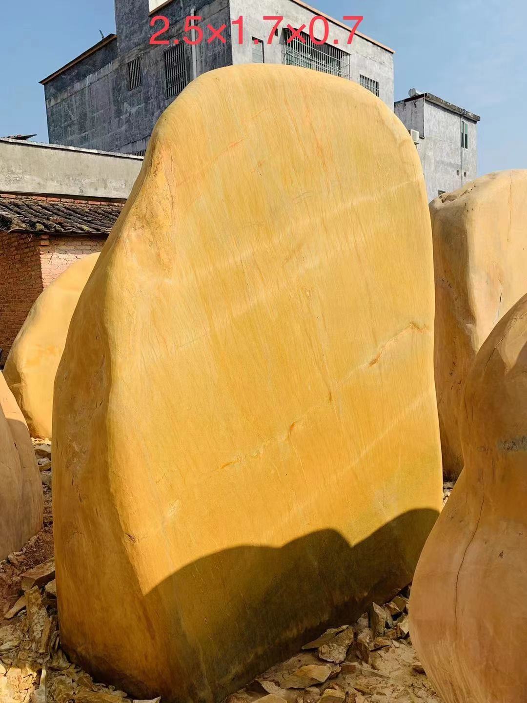 透明的黄蜡石价值多少钱一克,黄蜡石的价值分地区吗