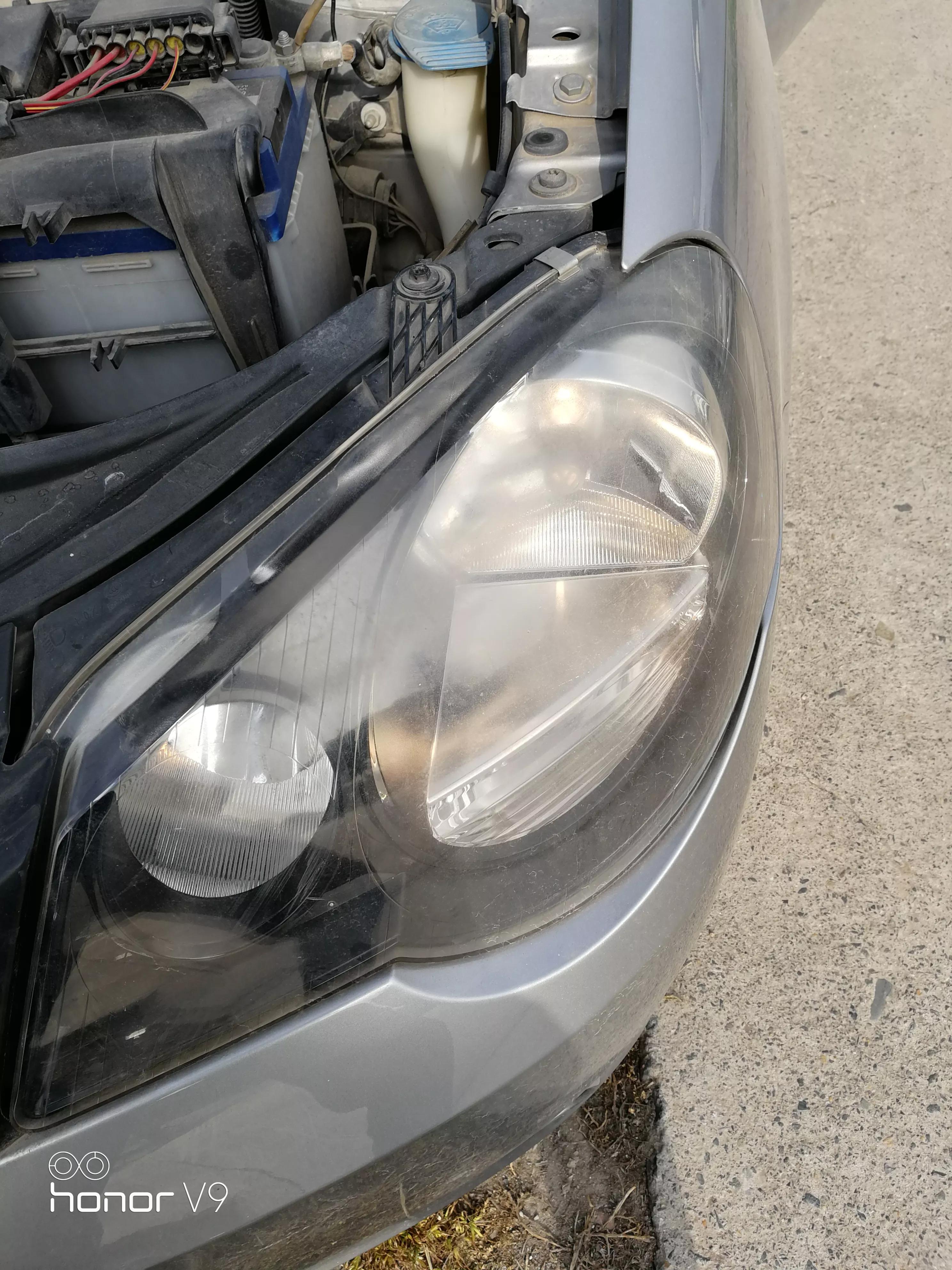 09大众polo近光灯怎么调高低,polo2011劲取改灯