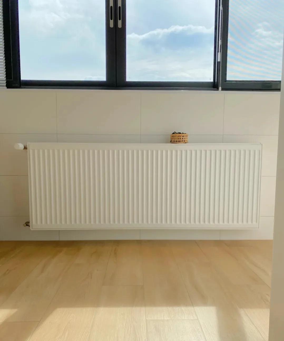 壁挂炉供暖选地暖还是暖气片,地暖与暖气片如何选择