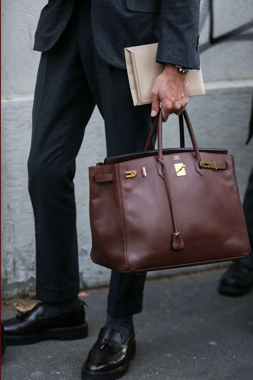 刘銮雄拍卖77个奢侈品包包,刘銮雄拍下的珠宝