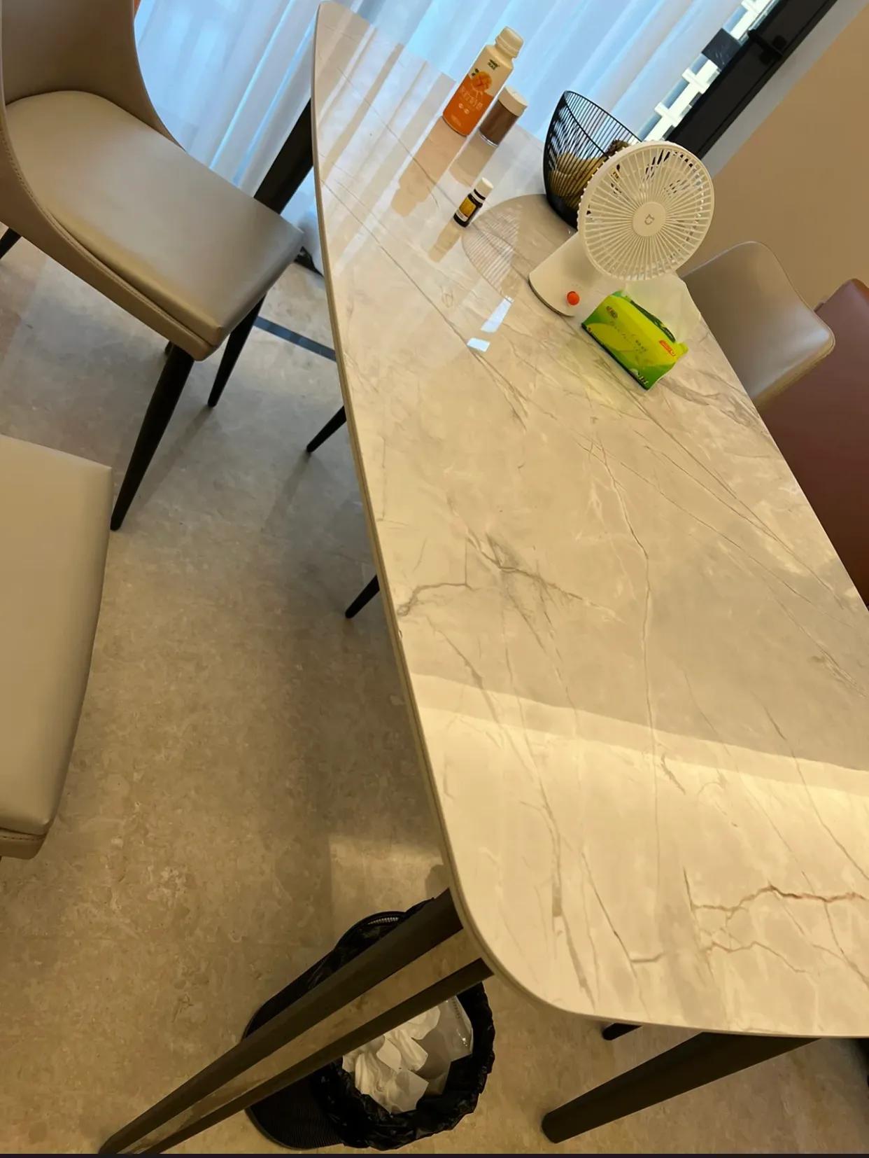 岩板餐桌跟天然石餐桌哪个好,七星石餐桌和岩板餐桌区别