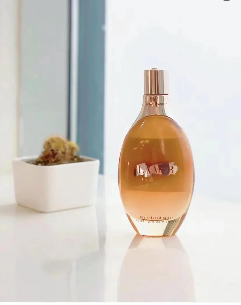 lamer海蓝之谜鎏金精华水,海蓝之谜lamer鎏金焕颜修护精华露