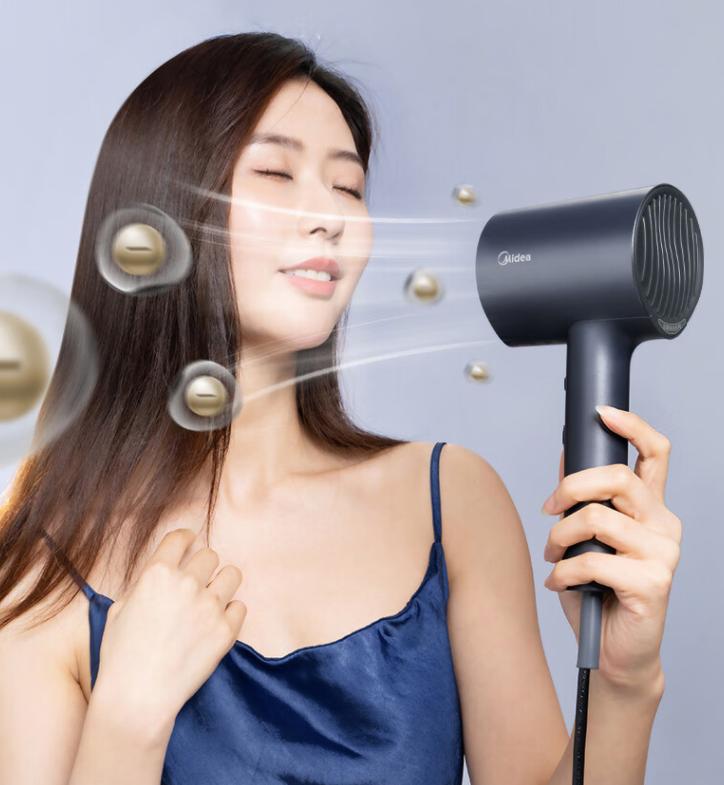 戴森高速智能电吹风,美的强力吹风机