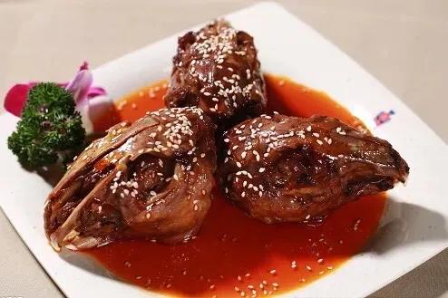 成都十大必吃小吃兔头,成都特色美食小吃鸭脑壳