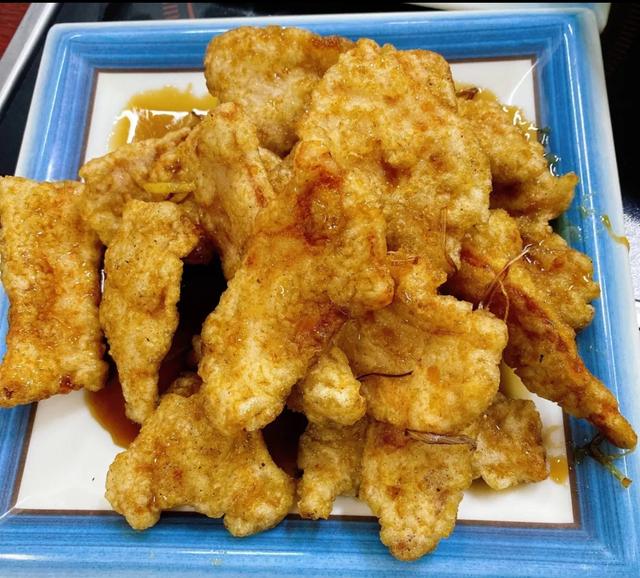 特色纸包鱼川渝菜馆,大东的纸包鱼店