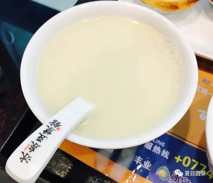 梧州特产冰泉豆浆400字,梧州骑楼老街美食冰泉豆浆