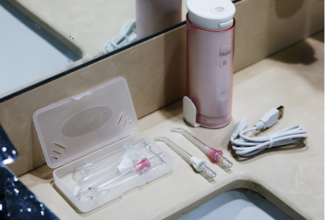 水牙线冲牙器和水牙线便携式区别,冲牙器水牙线