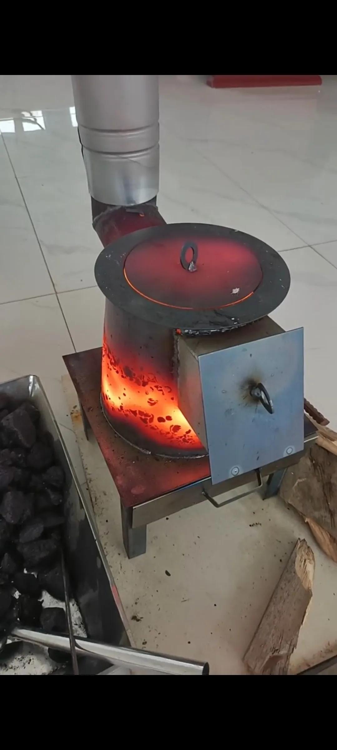 牛人发明的节能柴火炉,为了省电费烧柴煮饭