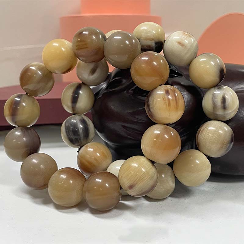 如何盘玩玉石手串,如何盘玩牛角手链