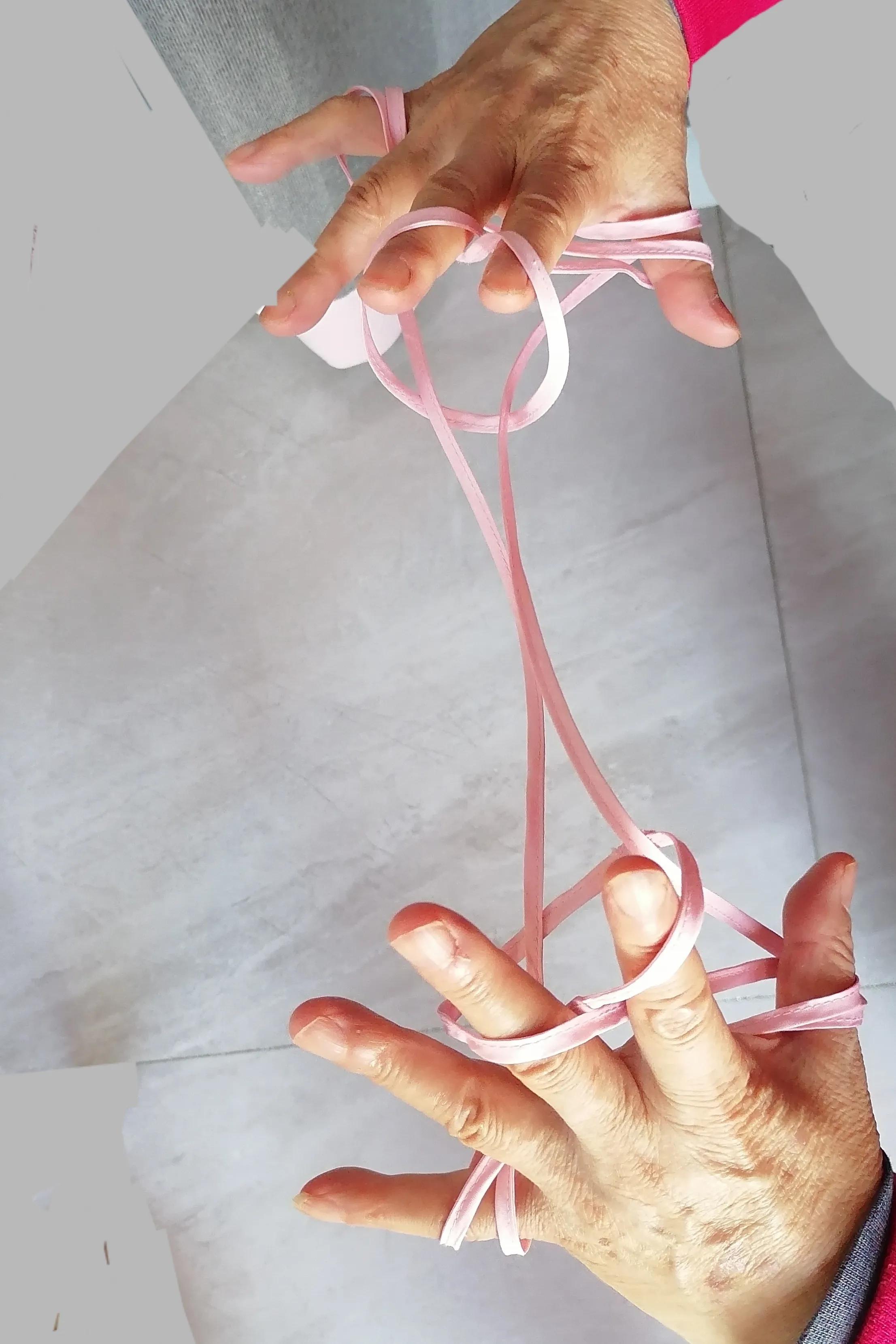 翻花绳游戏过程100字,两人玩的翻花绳游戏小技巧