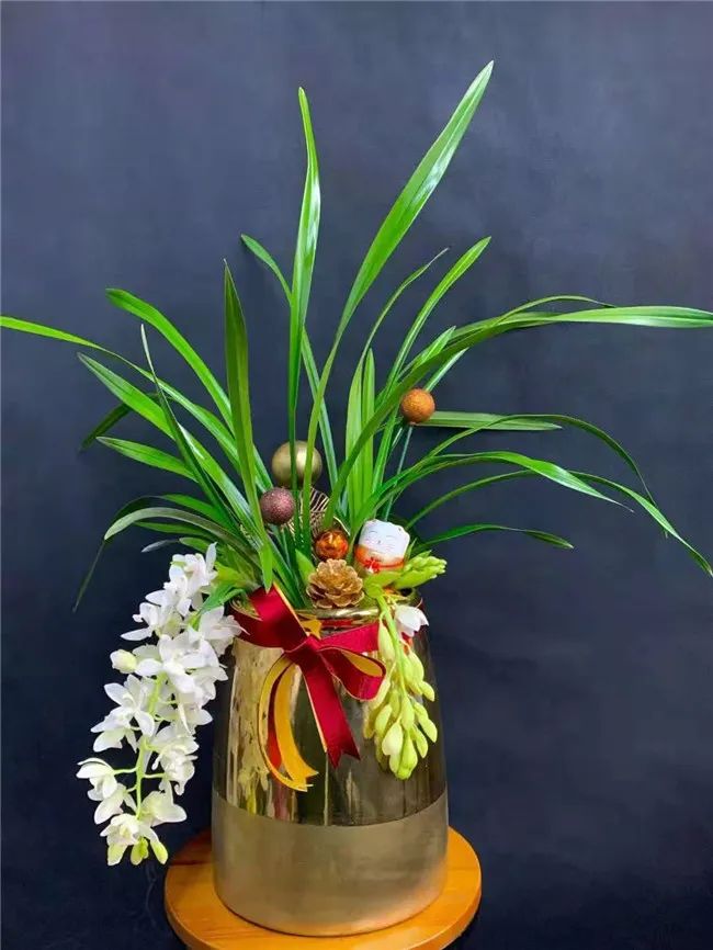 他在花市开了三家“非常规”花店，业绩不凡，成为同行学习的样板