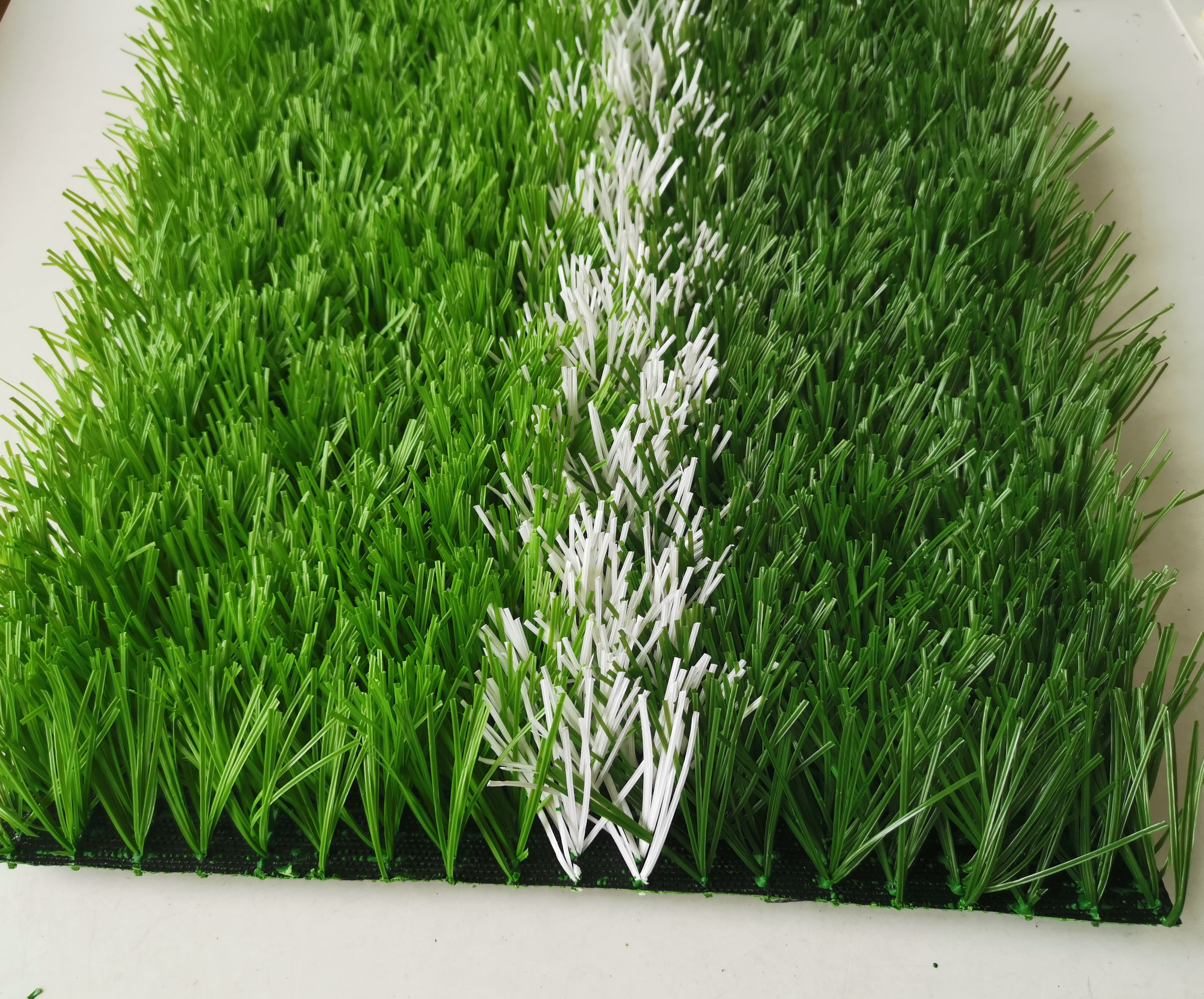 新国标人造草坪填充材料,新国标人造草坪施工