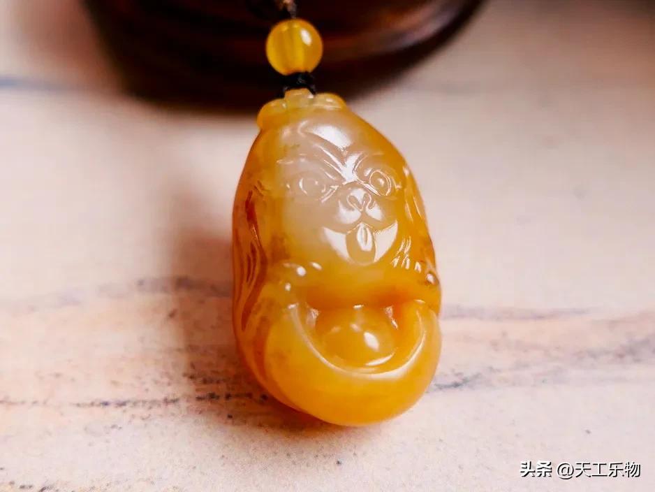 和田玉黄沁籽料大师玉雕极品图片,1200克的和田玉籽料黄沁多少钱