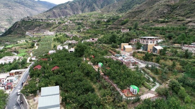 小金县扶贫,小金助力三农