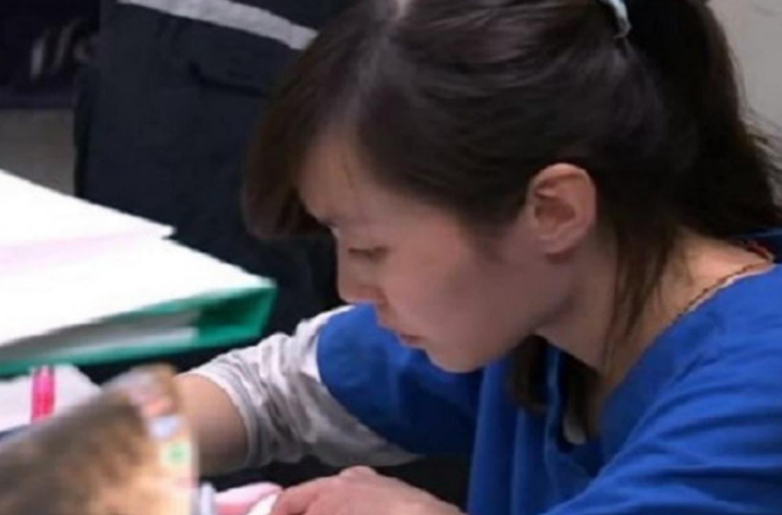 女孩给流浪狗安乐死,台湾女子给狗狗安乐死