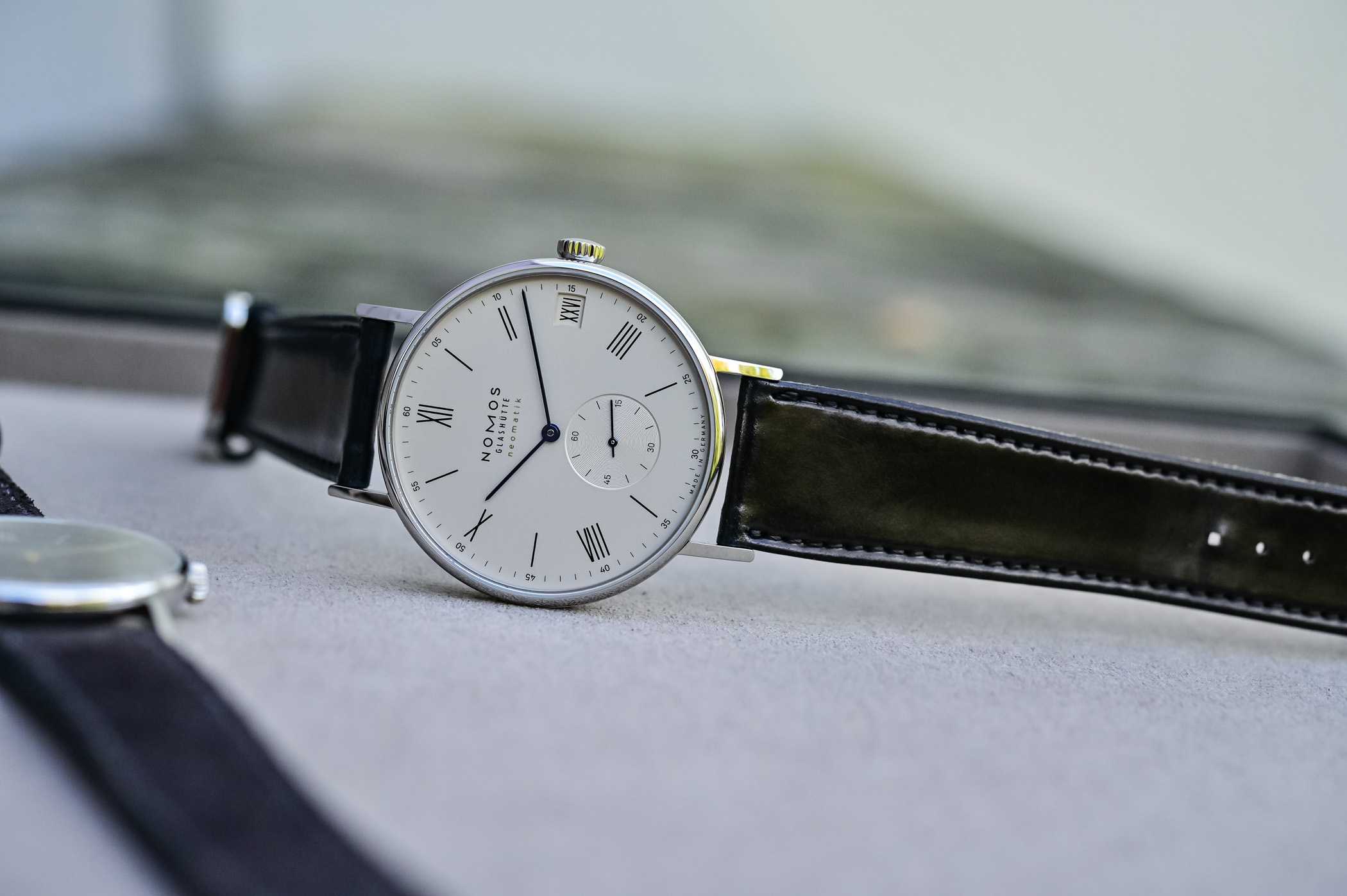 nomos鎵嬭〃鏈夊甫鏃ュ巻鐨勫悧,nomosludwig鎵嬭〃